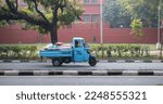 Small photo of Chandigarh, India-Jan 10 2022: Piaggio Ape Electric three Wheeler Cargo loaded with goods on road in Chandigarh city at sector 29.
