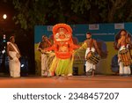 Small photo of New Delhi, India-27 May 2023: Theyyam artist performing ritualistic dance for public at India Gate, consists of traditions, rituals and customs associated with temples and sacred groves of Malabar.