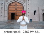 Small photo of Jaipur, Rajasthan, India-July 7 2023: Indian Concierge Welcome Guest at Hotel Entrance at Five star hotel in Jaipur.