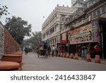 Small photo of New Delhi, India-Dec 31 2023: In winter, an early morning view of the main street in Chandni Chowk, Old Delhi. Motor vehicle ban openly flouted in Delhi’s Chandni Chowk road.