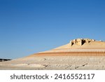 Small photo of Mangystau desert landmark, Kyzylkup area, Kazakhstan. Rock strata formations