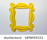 Yellow photo frame or mirror...