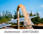 Small photo of Ground water is pumped using solar energy for irrigation purpose. Solar water pump concept.