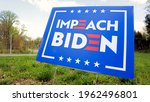 Small photo of Germantown, Maryland, USA 04-18-2021: An Impeach Biden yard sign at a roadside location in Maryland shows the ideological division, opposition and polarization in US politics.