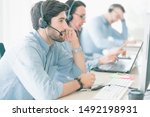 Small photo of Team Business Operator in Office. Costumer Service Business, Call Center Team with Headset. The Center Appealed to Consumers to Help Identify Action Recovery Disaster.