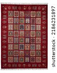 Small photo of Afghan hand woven rug on a white background