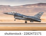 Small photo of A U.S. Air Force pilot from the 55th Expeditionary Fighter Squadron takes off during Desert Falcon in Israel, Jan. 16, 2022.