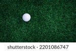 Small photo of Golf ball close up on tee grass on blurred beautiful landscape of golf background. Concept international sport that rely on precision skills for health relaxation. top view