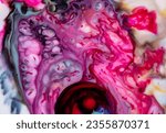 closeup photo of mixing oil paints in milk