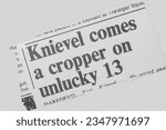Small photo of Knievel comes a cropper on unlucky 13 - news story from 1975 UK newspaper headline article title pencil sketch