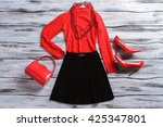 Red Top With Black Skirt....