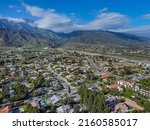 Small photo of Upland, California, USA â€“ April 20, 2022: Top Aerial Drone View of San Antonio Heights Upland, CA with North Mountain View