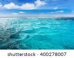 Caribbean sea surface summer wave background. Exotic water landscape with clouds on horizon. Natural tropical water paradise. Cuba nature relax. Travel tropical island resort. Ocean nature tranquility