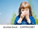 Small photo of Seasonal allergy in a child. Coryza. Selective focus. nature