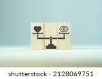 Small photo of Balancing hard and soft skills concept. Training of skills Human resource management(HRM). wooden cubes with hard and soft skills on scales icon for comparison human skills. Grey background copy space