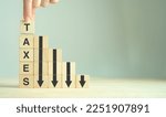 Small photo of Tax cuts, tax reduction concept. Tax relief for individuals or businesses experiencing financial hardship, economic crisis, coronavirus pandemic. Stimulate the economy, encourage investment, spending
