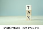 Small photo of Tax cuts, tax reduction concept. Tax relief for individuals or businesses experiencing financial hardship, economic crisis, coronavirus pandemic. Stimulate the economy, encourage investment, spending