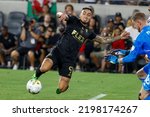 Small photo of Los Angeles FC forward Cristian Arango (9) tries to score on Real Salt Lake goalkeeper Zac MacMath (18) during an MLS soccer match Sunday, Sept. 4, 2022, in Los Angeles.