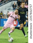 Small photo of Inter Miami's Lionel Messi (L) and Los Angeles FC's Aaron Long (R) in actions during an MLS soccer match Sunday, Sept. 3, 2022, in Los Angeles.