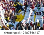 Small photo of Michigan wide receiver Semaj Morgan #82 is brought down by Alabama defensive back Kool-Aid McKinstry #1 during the 2024 Rose Bowl game Monday, Jan. 1, 2024, in Pasadena, Calif.