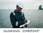 Marine navigational officer or chief mate on navigation watch on ship or vessel