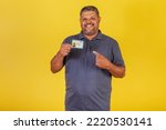 Small photo of Brazilian man, adult with identity card, RG. Brazilian document.