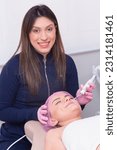 Small photo of beauty professional applying on woman's face, beauty photo, anti aging procedures. Plasma jet application. Aesthetics, spa. beautician.