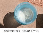 Small photo of Swimming pool chemical settle after dilute, calcium hypochlorite chlorine 70percent after dilute with water, water treatment