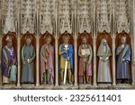 Small photo of St Albans, Hertfordshire - 07 01 2023 :The painted statue sculptures of the martyrs that stand in the medieval nave screen in St Albans Cathedral