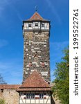 Small photo of View of the Roeder Gate Tower (Roedertorturm) , behind the Roeder Gate (Roedertor) at the east entrance to the medieval old town of Rothenburg ob der Tauber, Bavaria, Germany