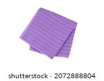 Small photo of Purple folded microfiber towel isolated on white background, top view.