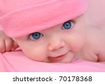 A Cute Little Baby Girl Is...