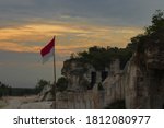 Small photo of Indonesia flag aflutter when dusk