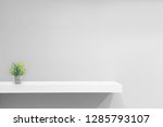 empty white shop shelf  retail... | Shutterstock . vector #1285793107