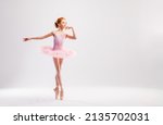 Little ballerina dancer in a...