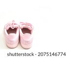 pink sneakers shoes with shoelace rear view on floor soft focus with copy space