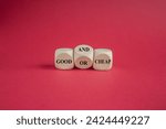 Small photo of Turned wooden cube and changes the expression good or cheap to good and cheap. Beautiful red background, copy space.
