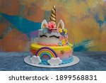 Colorful unicorn birthday cake. Rainbow fondant unicorn cake.  Details on a rainbow unicorn cake.