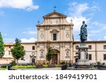 Small photo of Florence, Italy - September 3, 2020: Neoclassical-style facade of the Dominican basilica of San Marco, in St Mark square with general Manfredo Fanti's statue, in Florence city center, Tuscany, Italy