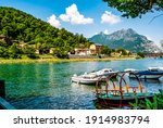 Small photo of Pescarenico, a district of Lecco, once a fishing village, on the left side of the river Adda, quoted in Alessandro Manzoni's novel The Betrothed, with moored boats, Lecco, Lombardia, northern Italy
