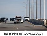 Small photo of Virginia Beach, Virginia, USA - December 24, 2021: An emergency services vehicle seen driving across the Lesner bridge in Virginia Beach while rushing to a medical emergency