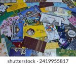 Small photo of Terengganu, Malaysia - 1 February 2024 : Close-up of hari raya aidilfitri money envelop. Various of beautiful design. Sampul duit raya idilfitri.