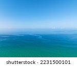 Aerial view Amazing open sea, Beautiful ocean in the morning summer season,Image by Aerial view drone shot, high angle view Top down sea background	