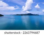 Aerial view summer sea in sunny day with long-tail fishing boat,Beautiful clouds blue sky background