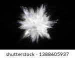White powder explosion on dark  ...