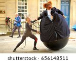Small photo of Bongo Bolero: Fat Cat.Sir Felix and Mousey perform their buffoonery at Bedlam Fair festival, in Kingsmead Square,Bath, England