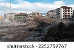Urban transformation, the process of redevelopment and revitalization of urban areas. Excavators in construction site demolishing old buildings in Golcuk Kocaeli Turkey. Selective focus included