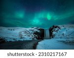 Aurora Borealis over Skogafoss in Iceland