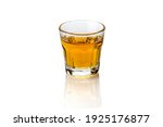 a short glass of Whiskey served neat, isolated on white background