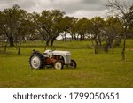 Antique Tractor In A Texas Field